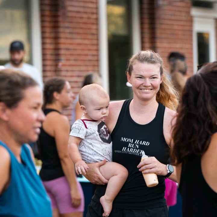 A Queen City Mother Runner with her baby