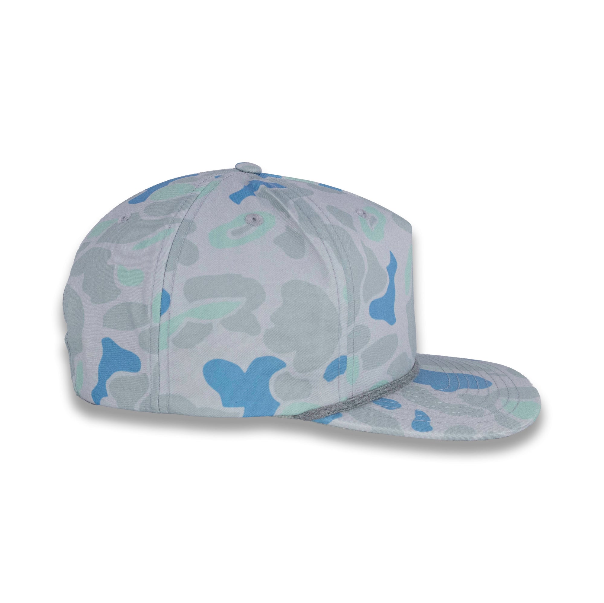 right side view of gray and blue camouflage baseball cap on a gray background