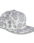 three quarter view of gray camouflage baseball cap on a white background